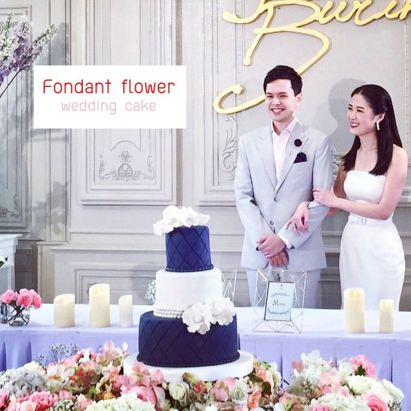 Fondant flower wedding cake